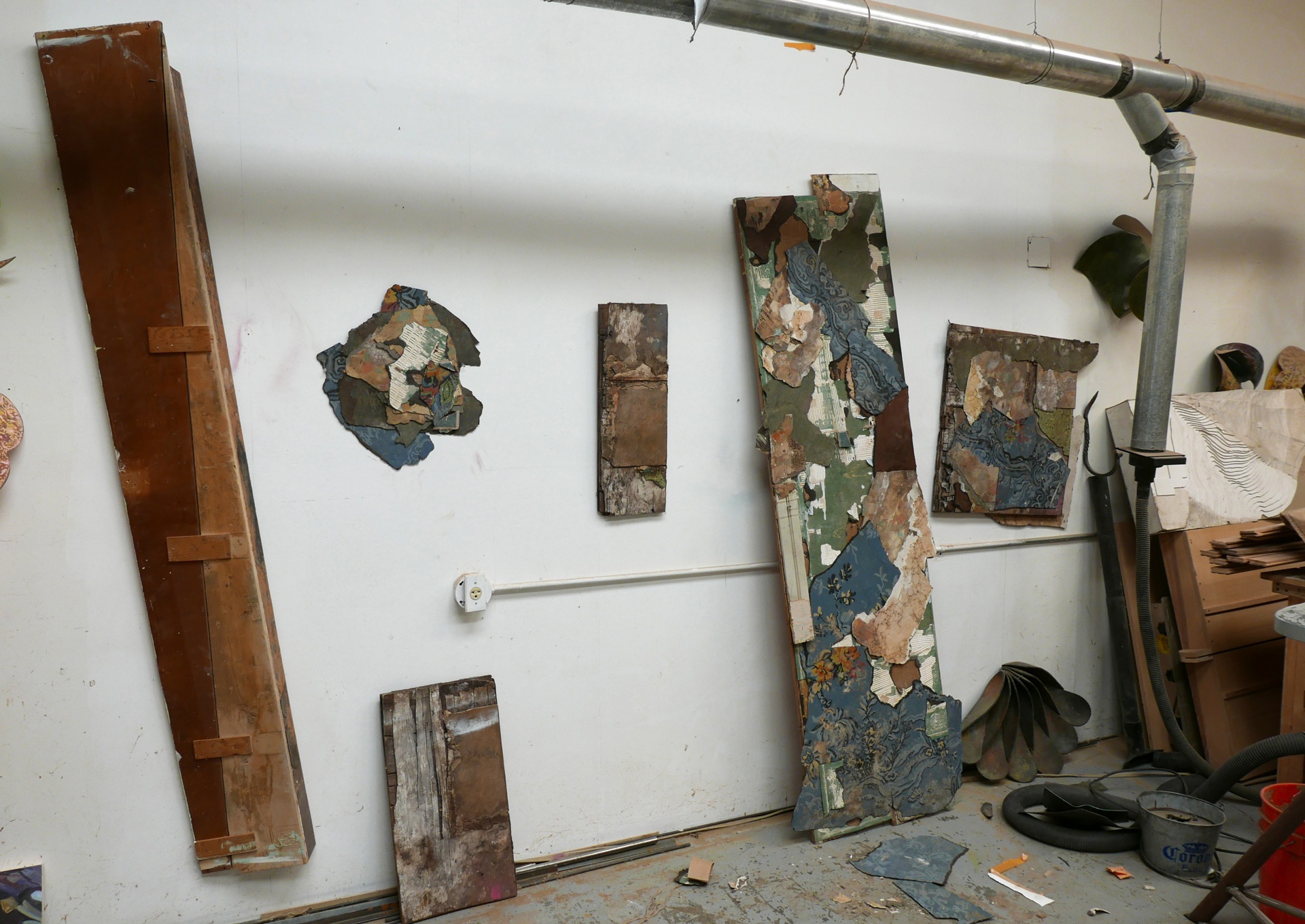 Tom Osgood's excavated mixed media works